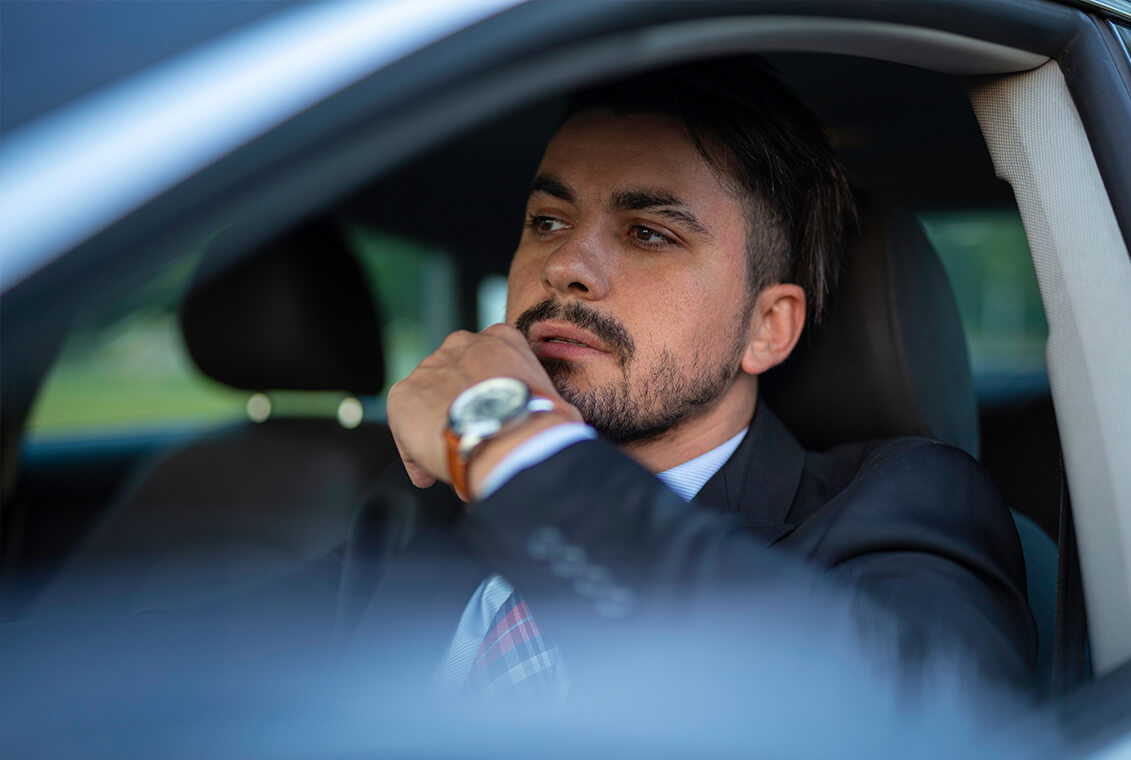 man thinking about buying new tires